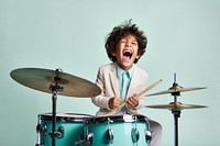 Boy playing drum accessories recreation performer.