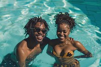 Black couple swimming in a pool accessories recreation accessory.