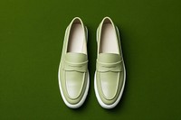 Cream loafers shoe clothing footwear apparel.