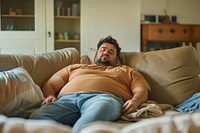 Stressed plus size man furniture blanket person.