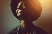 Black androgyne people with big smile photography laughing portrait.
