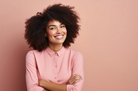 Portrait of beautiful happy black woman standing with arms crossed portrait photography dimples.