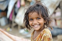 Poor child smiling happily in an atmosphere of poverty shoulder person female.