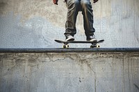 Man playing skateboard clothing footwear apparel.