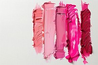 Lipsticks swatch in 3 shades of pink cosmetics clothing apparel.