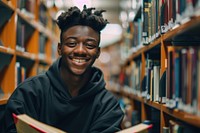 Happy Black boy Students library reading book.