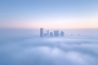 Downtown Dubai with skyscrapers building fog architecture.