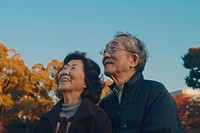 Senior asian couple happy photo accessories.