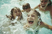 Children laughing and swimming in the pool people happy photography.