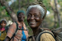 Smiling african senior woman hiking with friends accessories accessory clothing.