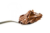 Chocolate spread on spoon cutlery dessert cream.