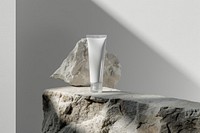 A transparent tube mockup pottery rock vase.