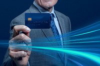 Businessman showing a credit card