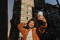 Black female blogger recording her live in downtown