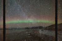 Northern lights over Iceland with starry sky