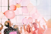 People playing with balloons at a party wallpaper