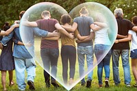 Group of friends huddle in rear view together