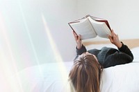 Woman reading a book on her bed during coronavirus quarantine remix