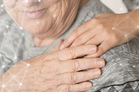 Elderly holding a hand on the shoulder