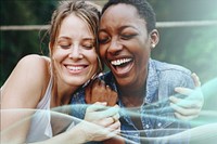 Happy black woman laughing with her friend