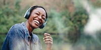 Woman listening to music in nature