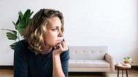 Stress woman sitting thoughtfully alone 