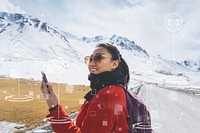 Young woman with a smartphone in the Himalaya mountains