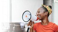Happy black woman with megaphone