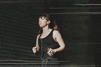 Sporty woman running in dark
