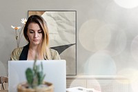 Relaxed woman working from home on her laptop