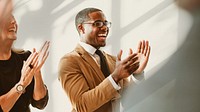 Diverse business people applauding with joy
