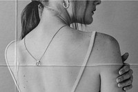 Female model wearing a necklace rear view