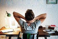 Man stressed while working on laptop