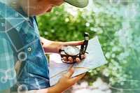 Boy following the directions of a compass