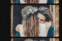 Groom hugging bride film frame