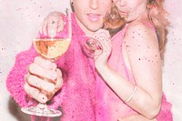Pink couple drinking wine together