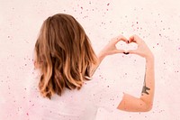Woman forming a heart with her hands