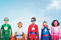 Diverse children in colorful superhero costumes