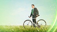 Business man pushing a bike outdoors, green business and environmental concept