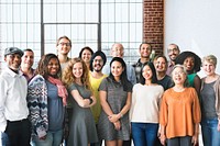 A team of diverse people doing a group photo