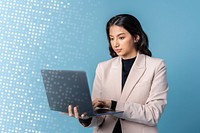 Businesswoman using a laptop on blue background