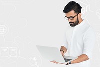 Indian man working on laptop