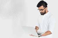 Indian man working on laptop