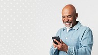 Happy retired man using a smartphone