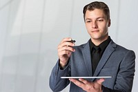 Businessman holding digital tablet png invisible screen