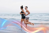 Couple jogging on a beach together