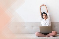 Woman stretching after working on laptop