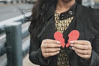 woman hold broken heart paper remix