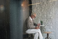 senior man sitting in cafe remix