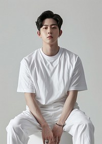 Korean wearing white t shirt mockup clothing apparel sitting.